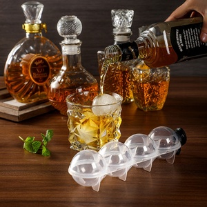 Moldes de Plástico para Cubos de Hielo Esféricos Transparentes Grandes de 4 Agujeros, para Hacer Discos de Hockey y Whisky - Product Image 1