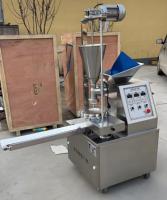 Machine automatique à baozi pour le remplissage et le façonnage de petits pains farcis à la vapeur