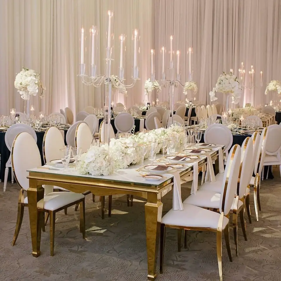 Mesa de comedor Rectangular con parte superior de mármol de acero inoxidable dorado para evento de boda, restaurante de alquiler de fiesta