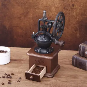 เครื่องบดเมล็ดกาแฟแบบโยกล้อแบบใช้มือในครัวเรือนย้อนยุคพร้อมลิ้นชักไม้