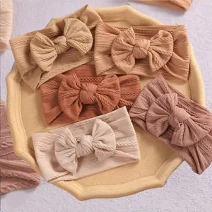Bandeau élastique en tricot chaud pour bébé fille bandeau oversize avec nœud papillon bandeau élastique en tissu nylon doux accessoires pour cheveux d'enfants