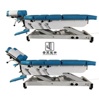 Table de traction dorsale à hauteur réglable électriquement pour la physiothérapie et la chiropratique, idéale pour les hôtels modernes et les salles de sport, en fer.