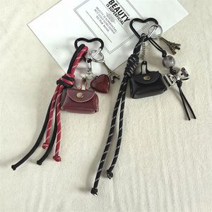 Hot-selling Instagram-style Cute Style <b>Leather</b> Mini Bag <b>Keychain</b> Niche Pendant Creative Schoolbag Wholesale - Product Image 2