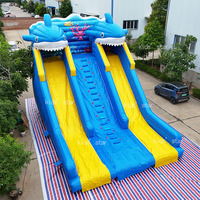 Château gonflable commercial géant à thème de dessin animé avec toboggan pour enfants, structure de saut gonflable