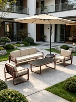 Ensemble de canapé et table basse en bambou minimaliste moderne pour l'extérieur, résistant au soleil et à l'eau, pour les jardins de villas et les terrasses d'hôtels