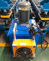 Machine automatique de formage à froid de tôles métalliques à double couche pour la production de tuiles de toiture ondulées et IBR