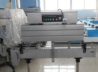 Machine de rétraction d'étiquettes pour col de bouteille, pour l'emballage de bouteilles en plastique et en verre