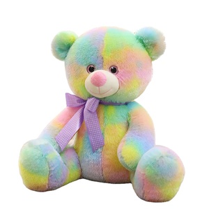 Orsacchiotto Peluche Tie Dye <span class=keywords><strong>Arcobaleno</strong></span>, Sfumatura Multicolore Pastello con Fiocco Viola a Pois - Product Image 1