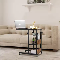 Table basse réglable en hauteur avec roues et support de rangement, adaptée aux chambres et aux salons