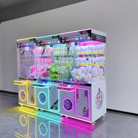 Machine à attraper les peluches commerciale, très populaire, entièrement transparente, grande, en plastique, avec garantie d'un an, à monnayeur, pour aire de jeux, modèle anglais