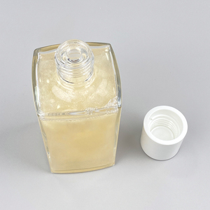 Huile corporelle hydratante 100 ml à base d'eau, bouchon doré, effet scintillant, éclaircissante, ingrédients naturels, huile corporelle tendance pour la beauté (OEM/ODM) - Product Image 1