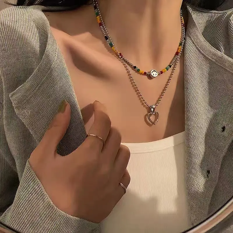 Collana con faccina colorata perline collana con ciondolo a cuore geometrico girocollo a doppio strato clavicola per gioielli da donna per ragazze