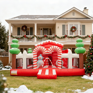 Château gonflable de Noël haut de gamme avec design Père Noël, bonhomme de neige et rennes pour événements festifs et activités en plein air - Product Image 1