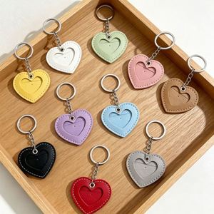 New Hot-selling PU Leather Anti-loss Luggage Tag Heart-shaped Access Card Holder Simple Keychain Pendant - Product Image 1