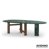 Table à manger ovale en marbre Verde Alpi sur mesure de luxe Avidiino, base asymétrique en bois de noyer pour projet de villa haut de gamme