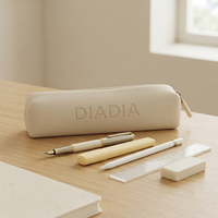 Étui à crayons minimaliste personnalisé en silicone, résistant à l'eau, avec fermeture éclair, portable, écologique, pochette pour pinceaux de maquillage, vente en gros, compact