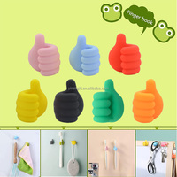 Vente chaude Creative Silicone Pouce Multi-Fonction Adhésif Clé Fil Crochet Câble De Charge Crochet Clip Pouce Crochets Câble Organisateur