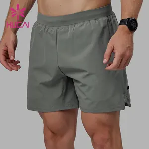 HUCAI定制标志高品质运动服分体下摆跑步健身房健身跑步短裤男