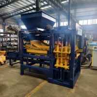 L'usine Zhongke fournit la machine à briques de béton emboîtables QT 4-15 et la ligne de production de blocs.