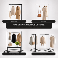 Porte-vêtements en îlot avec support au sol en forme d'arc pour l'affichage central en magasin de vêtements et la présentation de la mode