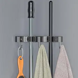 Çin üretimi temizleme aracı depolama paspas tutun süpürge sahipleri ile hooks kendinden yapışkanlı çelik çubuk wallmounted duvar tutucu