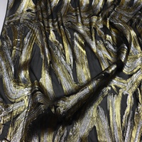 Tissu en Soie Métallique Noir Brillant Naturel et Biologique avec Lurex Or et Argent pour Manteau, Chemise et Vêtements