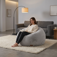 Fauteuil pouf moderne et luxueux en fausse fourrure colorée, une place, avec housse amovible pour enfants et adultes