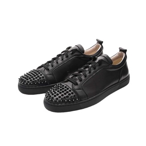 Baskets en cuir noir respirantes en maille antidérapantes pour hommes et femmes, style rétro décontracté, semelle rouge - Product Image 1