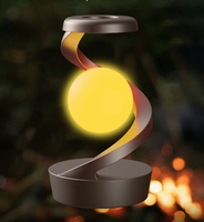 2025 nouveau produit chargeur sans fil flottant capteur de lévitation lumière de table lune lampe à suspension rotative pour chambre