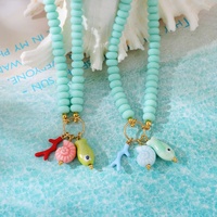 Collar de cuentas de turquesa estilo bohemio Asu con dijes de esmalte de océano, pez, concha y coral, joyería de verano para mujer