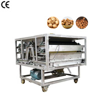 Machine commerciale automatique de décorticage et de cassage des noix de pécan et des noix noires