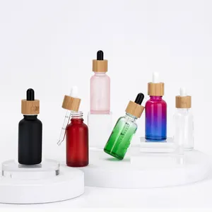 High quality essential oil container 5ml 10ml 15ml 20ml 30ml 50ml 100ml glass dropper bottle with bamboo lid