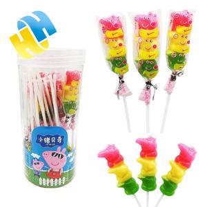 Vendita calda cartone animato a forma di maiale tre colori fumi caramelle lecca-lecca misto sapore di frutta colorata gelatina di fumi divertente cera per bambini scatola - Product Image 1