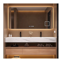 Ensemble complet de meubles de salle de bain en panneaux de particules : meuble sous-vasque, baignoire, toilettes