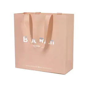 Shopping Bag in carta rosa stampata con Logo personalizzato con manico a nastro