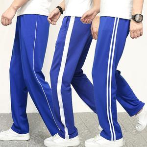 Pantalones de uniforme escolar azules con rayas blancas, corte holgado para niños y niñas, estudiantes de primaria, secundaria y preparatoria - Product Image 1