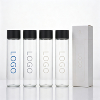 Bouteilles d'eau en verre Voss écologiques en gros avec bouchon noir sans BPA, cylindriques, pour jus détox, smoothies, lait et autres boissons