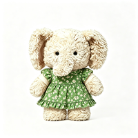 Vente en gros d'éléphant en peluche doux et bouclé, vêtu d'une robe verte à fleurs, design personnalisé, mascotte, cadeau, jouet en peluche