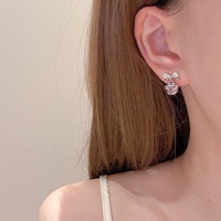 Boucles d'oreilles pendantes en cuivre plaqué avec nœud mignon, cœur rose, zircon cubique et patte de chat, idéales pour le quotidien des femmes, vente en gros