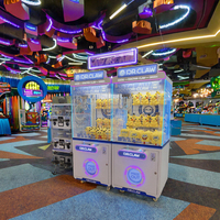 Machine à griffes amusante pour enfants Jeux d'arcade de chasse au trésor colorés à pièces Jouet poupée griffe grue Machine pour l'amusement