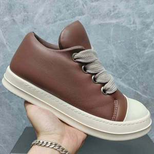 Chaussures de sport en cuir véritable de haute qualité pour hommes et femmes, élégantes, à semelle épaisse, chaussures décontractées de luxe, chaussures de course à lacets pour l'extérieur - Product Image 1