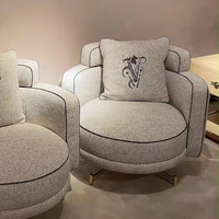 Fauteuil individuel de luxe léger italien, design moderne et épuré, pour salon de villa, chaise de loisirs en tissu pour la maison
