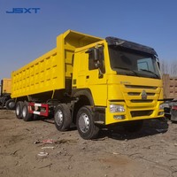 Camion benne lourd diesel Sinotruk HOWO 8x4 remis à neuf avec moteur Weichai, direction à gauche, 12 roues, pour la Tanzanie