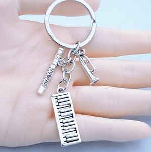 Moda DIY <span class=keywords><strong>teclado</strong></span> órgano electrónico guitarra <span class=keywords><strong>flauta</strong></span> cuerno música llavero profesional accesorios creativos de Metal - Product Image 4
