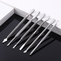 Poussoir à cuticules pour ongles avec conception à double tête pour l'élimination des peaux mortes Fader de manucure en acier inoxydable pour l'élimination des peaux mortes