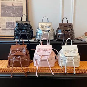 Sac à dos en cuir PU 2026 pour femme avec nœud, sac de voyage décontracté léger à cordon de serrage et rabat pour usage quotidien - Product Image 1