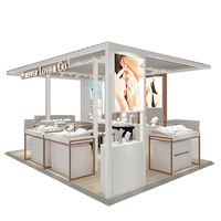 Vitrine d'îlot personnalisée de luxe pour bijoux avec vitrine en verre et boîte lumineuse, comptoir de vente de bagues en or et diamants pour centre commercial