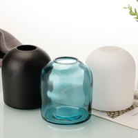 Diffuseur de parfum en verre élégant et personnalisable pour la maison, avec un design moderne et unique
