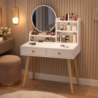 En gros Coiffeuse compacte pour chambre avec étagère de rangement ouverte, miroir de maquillage rond et pieds en bois
