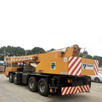 Grue mobile sur camion TADANO TL300E d'occasion de 30 tonnes avec système hydraulique d'origine, flèche complète de 33,5 m pour travaux de levage en construction